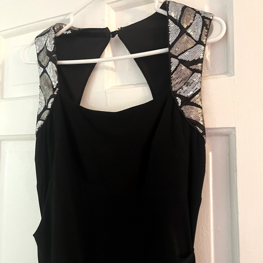 Elegant Black floor length gown. Designer Cache.